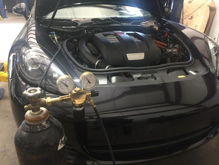 Shown here is a Porsche Panamera having the Air Suspension System filled with Nitrogen after a Compressor replacement.  We use the factory suspension filling station to make sure these expensive parts get properly installed and give the most life.